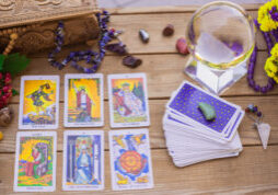 Tarot card on a table, White magic, attributes for witch, magic for love, health, attracting happiness .